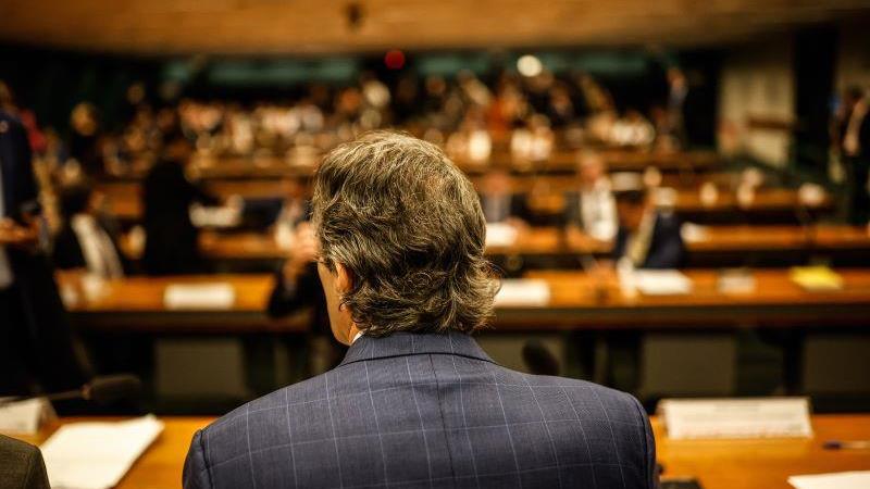 O ministro Fernando Haddad em debate na Câmara dos Deputados. Reunião acabou em tumulto.